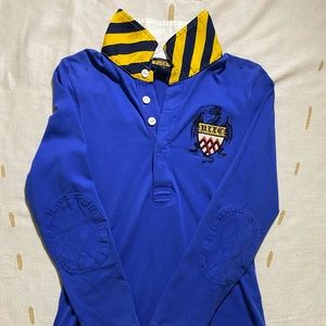 Bright blue Rugby shirt.